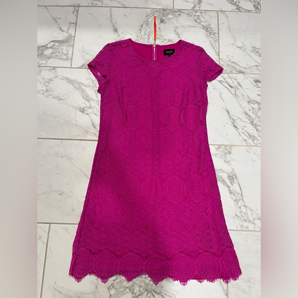 Beautiful pink laundry desk with gorgeous lace detailing!